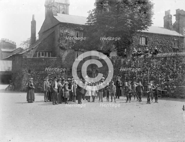 Beating the Bounds ceremony, St Michaels Church, Cornmarket Street, Oxford, Oxfordshire, 1914. Artist: Henry Taunt