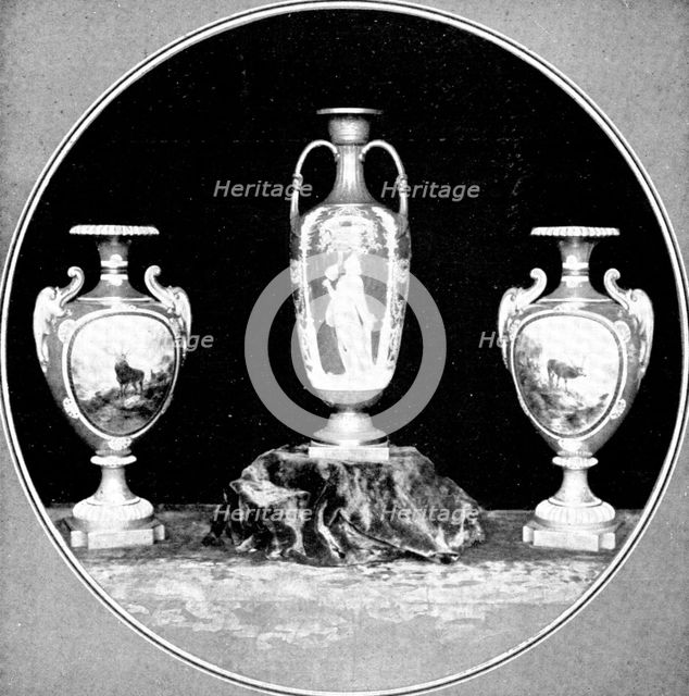 Beautiful examples of the potter's craft: a fine pair of Worcester vases and a..."Solon" vase, 1909. Creator: Unknown.