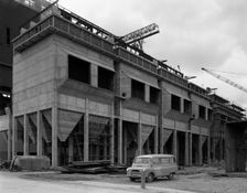 Bedford CA Minibus parked on a building site in West Burton, Nottinghamshire, 1964. Creator: Michael Walters