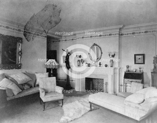 Bedroom with fireplace, padded chaise longue, sofa, male nude..., Greenwich, Connecticut, 1908. Creator: Frances Benjamin Johnston.