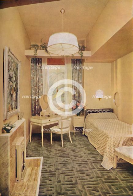 'Bedroom designed by Esmé Gordon, A.R.I.B.A., A.R.I.A.S., with Greek key design W Wilton Carpet by J Artist: Unknown.