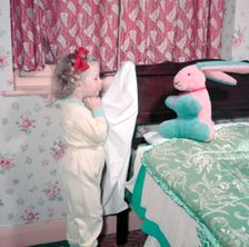 Bedtime for a little girl, c1955. Creator: Arthur Charles Kirby Ware
