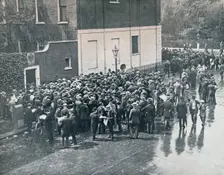 Before England declared war: German Reservists waiting outside German Consulate in London, 1914