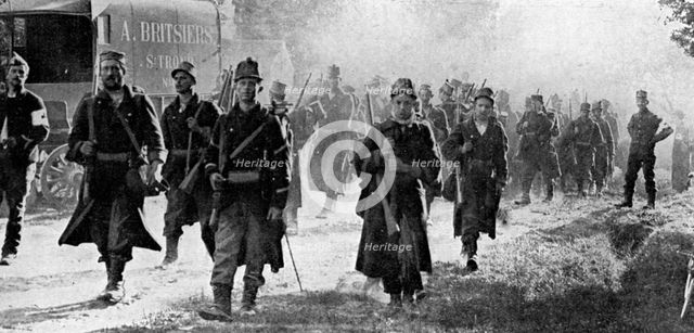 Belgian troops nearing the scene of battle, First World War, 1914. Artist: Unknown