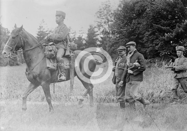 Belgian Franctireurs, prisoners of German Hussars, between 1914 and c1915. Creator: Bain News Service.