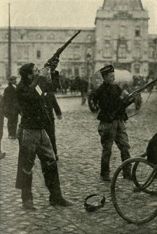 Belgian military cyclists shooting at a German plane, First World War, 1914-1918, (c1920). Creator: Unknown