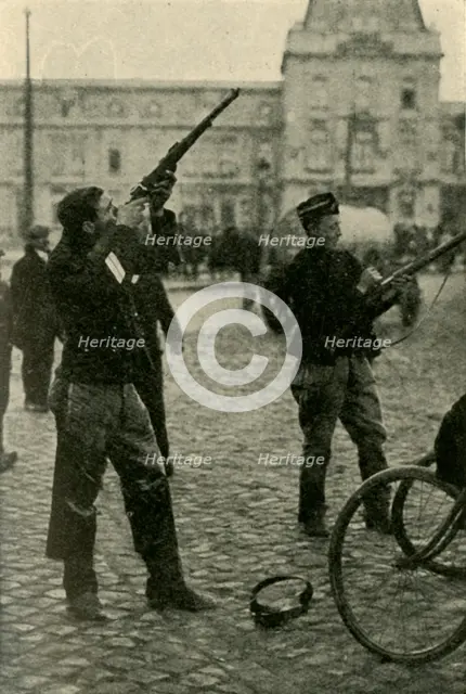 Belgian military cyclists shooting at a German plane, First World War, 1914-1918, (c1920). Creator: Unknown.