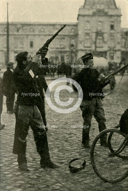 Belgian military cyclists shooting at a German plane, First World War, 1914-1918, (c1920). Creator: Unknown.