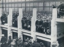 Belgian refugees on the harbour at Ostend waiting for a boat to take them to England, 1914