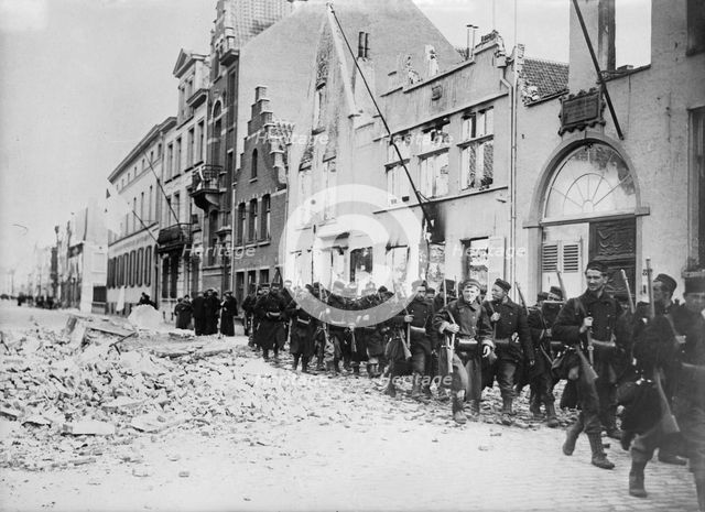 Belgians re-enter Termonde, between c1914 and c1915. Creator: Bain News Service.