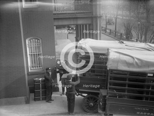 Belongings of Count J.H. Von Bernstorff being removed from the German Embassy, Washington DC, 1917.  Creator: Harris & Ewing.