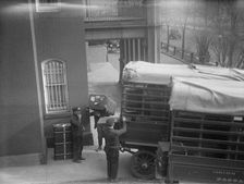 Belongings of Count J.H. Von Bernstorff being removed from the German Embassy, Washington DC, 1917. Creator: Harris & Ewing