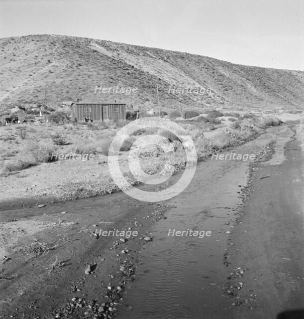 Below the bench, showing condition of road which..., Dead Ox Flat, Malheur County, Oregon, 1939. Creator: Dorothea Lange.