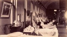 Bellevue Hospital, New York City: a ward for male patients with case-notes..., c1885/1898. Creator: Unknown