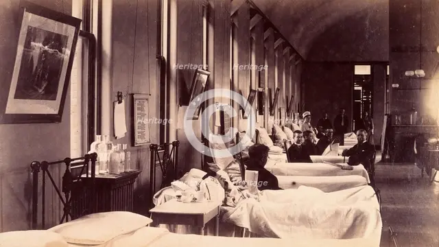 Bellevue Hospital, New York City: a ward for male patients with case-notes...,  c1885/1898. Creator: Unknown.