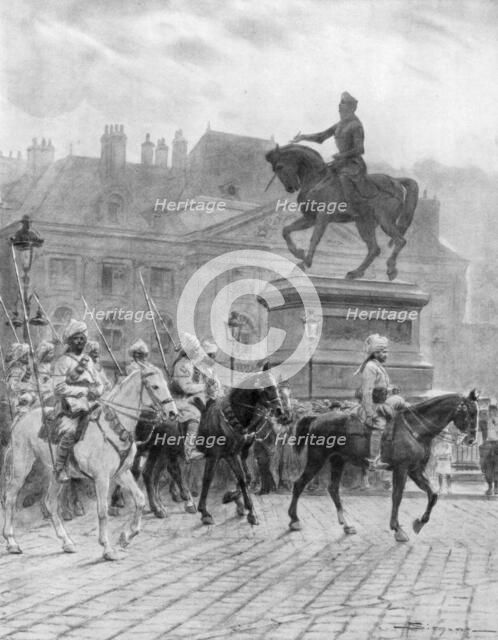 'Bengal Mounted Lancers passing the statue of Joan of Arc', France, 1914, (1926).Artist: J Simont