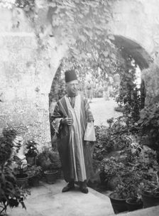 Benetti, Franco, Mr., standing outdoors, 1929 Creator: Arnold Genthe