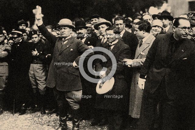Benito Mussolini, between the members of the Fascist Party, shortly after the "March on Rome". Creator: Anonymous.