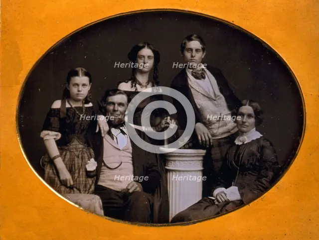 Benjamin family group portrait, posed around a column, between 1845 and 1858. Creator: Edward Tompkins Whitney.
