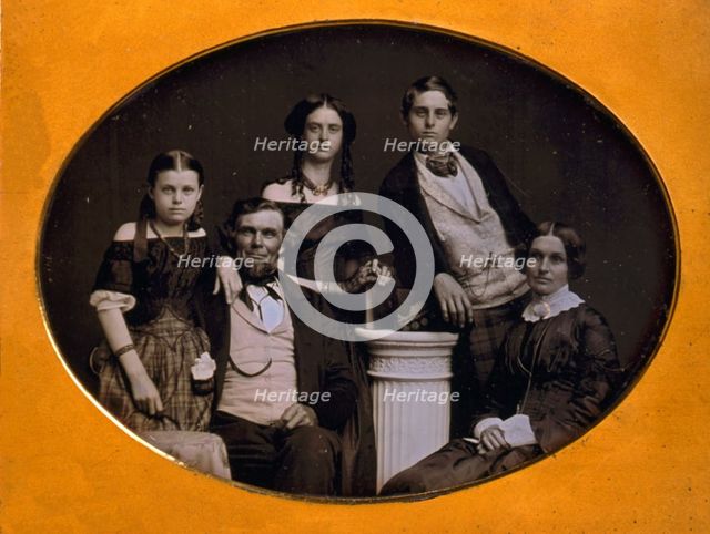 Benjamin family group portrait, posed around a column, between 1845 and 1858. Creator: Edward Tompkins Whitney.