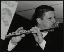 Benn Clatworthy playing the flute at The Fairway, Welwyn Garden City, Hertfordshire, 2002. Creator: Denis Williams