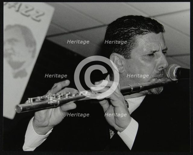 Benn Clatworthy playing the flute at The Fairway, Welwyn Garden City, Hertfordshire, 2002. Artist: Denis Williams
