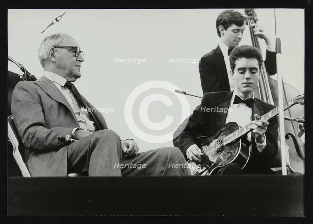 Benny Goodman watching Phil Flanigan and Chris Flory, Knebworth, Hertfordshire, 1982. Creator: Denis Williams.