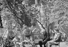 Benson, Mary, Mrs., with Arnold Genthe and an unidentified woman seated ouside at..., c1933-c1942. Creator: Arnold Genthe