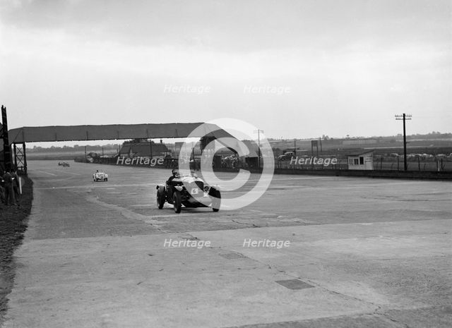 Bentley and Frazer-Nash BMW racing at Brooklands, 1938 or 1939. Artist: Bill Brunell.