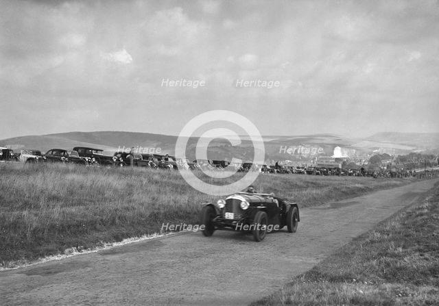 Bentley competing in the Bugatti Owners Club Lewes Speed Trials, Sussex, 1937. Artist: Bill Brunell.