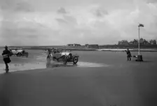 Bentley of ER Insole and Austin of RW Thomas competing in the Porthcawl Speed Trials, Wales, 1922. Artist: Bill Brunell