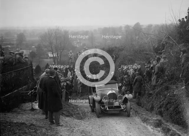 Bentley of FE Elgood competing in the MCC Exeter Trial, Ibberton Hill, Dorset, 1930. Artist: Bill Brunell.