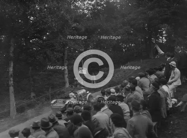 Bentley open 4-seater competing in the Shelsley Walsh Hillclimb, Worcestershire, 1935. Artist: Bill Brunell.