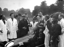 Bert Hadley and his winning Austin car, Imperial Trophy, Crystal Palace, 1939. Artist: Bill Brunell