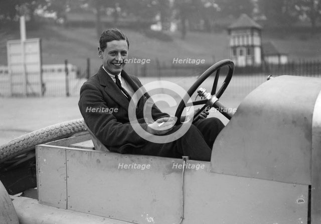 Bertie Kensington Moir in an Aston Martin crude test body, Brooklands, c1921. Artist: Bill Brunell.