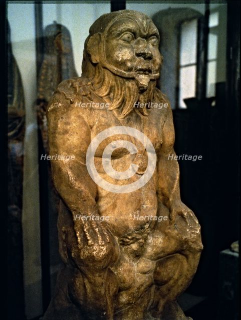 Bes, protector genius of Egyptian mythology in a statue of the Ptolemaic age.