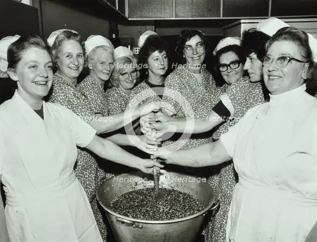 Bessemer Grange School, Camberwell, London: kitchen staff make Christmas puddings, 1970. Creator: Unknown.