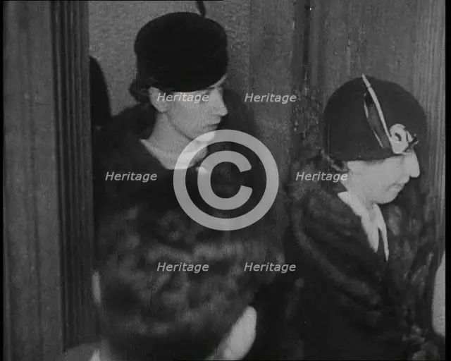 Bessie Mowat Goway AKA Betty Gow, Nurse of the Lindbergh Family Entering a Courtroom, 1930s. Creator: British Pathe Ltd.