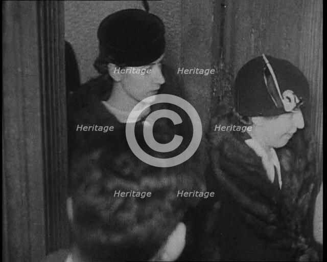 Bessie Mowat Goway AKA Betty Gow, Nurse of the Lindbergh Family Entering a Courtroom, 1930s. Creator: British Pathe Ltd.