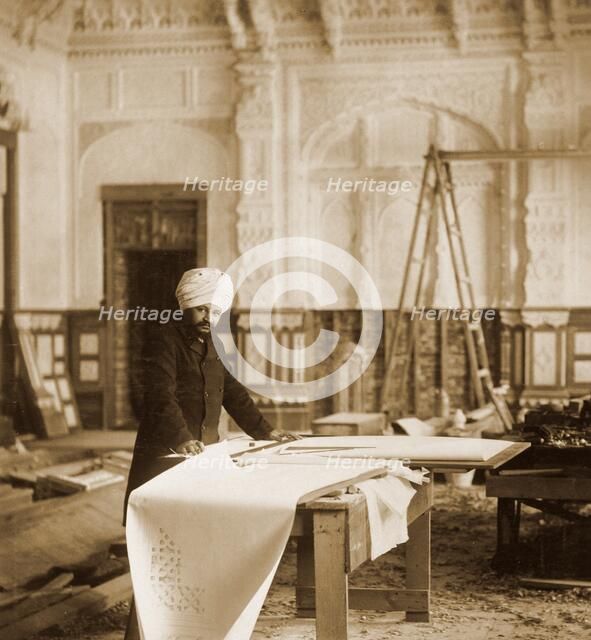 Bhai Ram Singh at work in the Indian Room, Osborne House, Isle of Wight, 1892. Artist: Unknown.