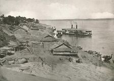 Bhamo - Irrawaddy Flotilla Mail Steamer at the Ghat 1900. Creator: Unknown