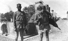 Bhistis, or water carriers, Agra, India, 1916-1917