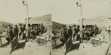 Bicycle stretchers bringing Russian wounded to a surgical station -- siege of Port Arthur, c1905. Creator: Underwood & Underwood