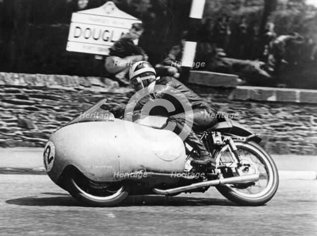 Bill Lomas at Governor's Bridge, Isle of Man Junior TT, 1955. Artist: Unknown