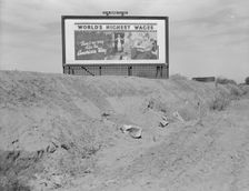 Billboard on U.S. Highway 99 in California, 1937. Creator: Dorothea Lange