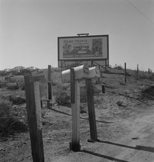 Billboard on U.S. Highway 99, California, 1937. Creator: Dorothea Lange