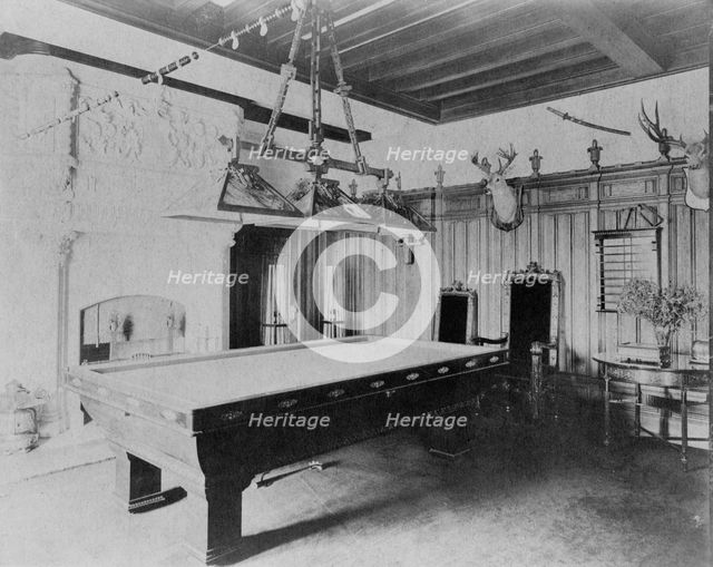 Billiard room, with a deer head and an elk head, in home of Edmund..., Greenwich, Connecticut, 1908. Creator: Frances Benjamin Johnston.