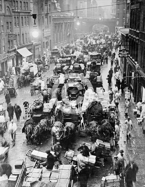 Billingsgate Market at 7am, London, 1937. Creator: Unknown.