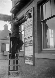Billposting at Charwelton Station, Northamptonshire, 1904. Artist: A Newton