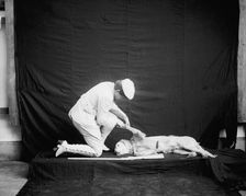 Billy and his mistress in hunting poses, between 1895 and 1910. Creator: Unknown